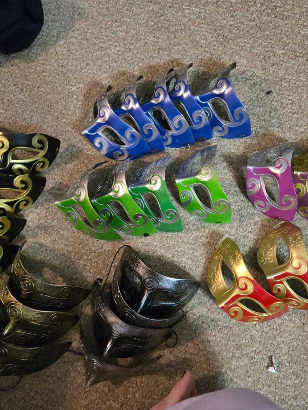 you get 5 random plastic, some fabric covered with feathers, masks